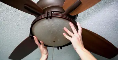 Ceiling fan repair and reinstallation on ceiling mount in St Paul, MN
