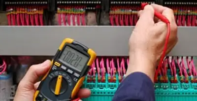 electrical service showing professional testing and troubleshooting of electrical panel by licensed electricians in St Paul, MN