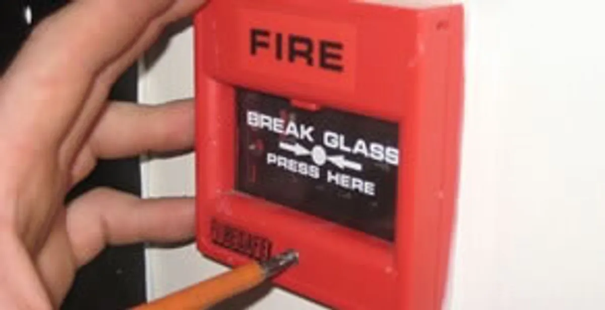 fire alarm installation service showing manual fire alarm pull station installed by licensed electricians in St Paul, MN