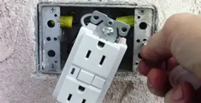 gfci circuits service showing installation of a ground fault circuit interrupter outlet by licensed electricians in St Paul, MN