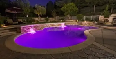 pool light installation and repair services illuminating a residential swimming pool in St Paul, MN
