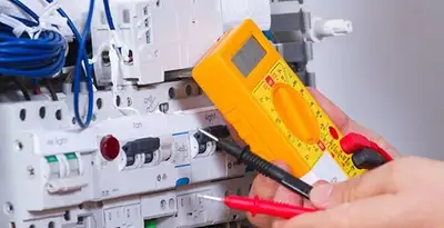 Residential electrician testing home electrical panel for safety and performance in St Paul, MN
