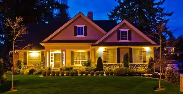 security light installation services illuminating a residential exterior at night in St Paul, MN